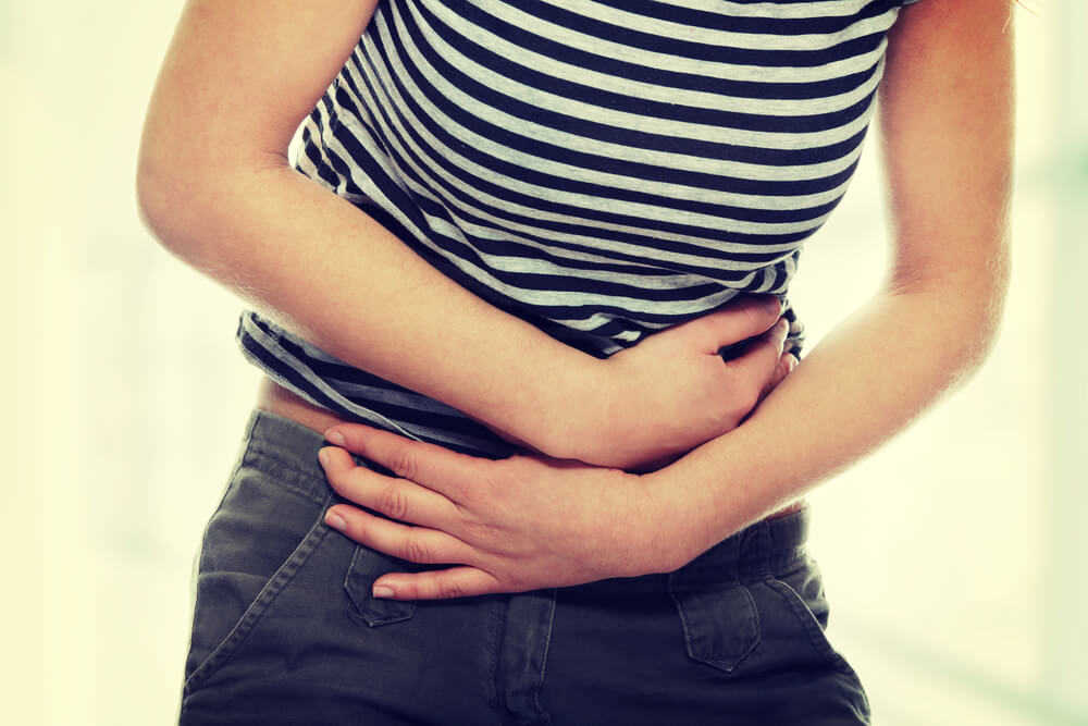 woman with irritating stomach